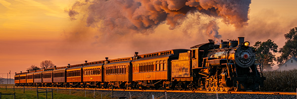 Steam train at sunset