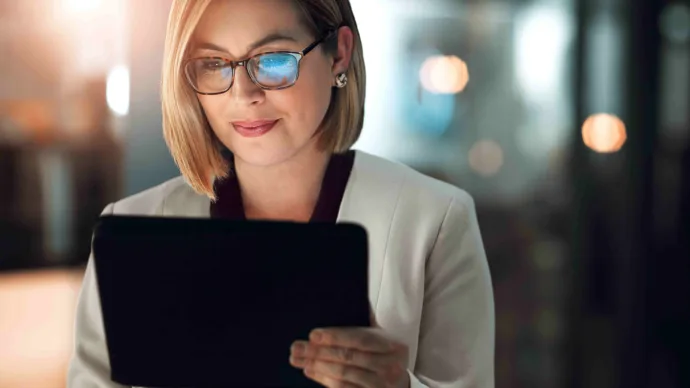 business woman working from a tablet