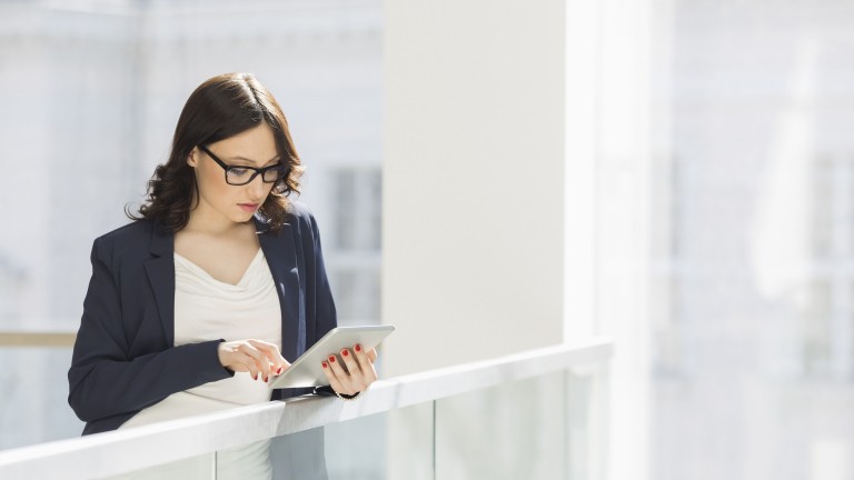 businesswoman-using-tablet