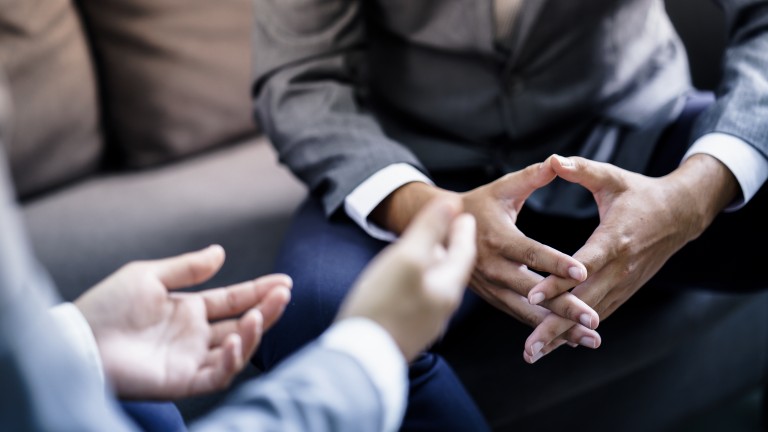 Two people talking
